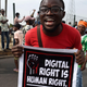 A man carries a banner calling for the end to the Twitter ban during a demonstration at Ojota in Lagos, Nigeria on June 12, 2021.